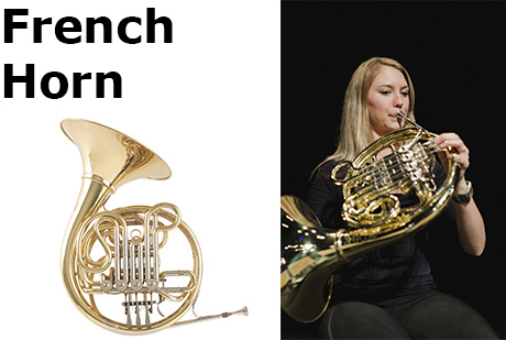 A woman playing the French horn