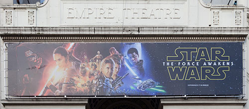 Star Wars: The Force Awakens movie poster outside a theater