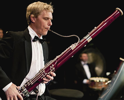 man playing the bassoon