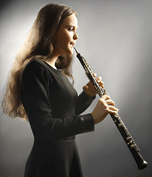 girl playing the oboe