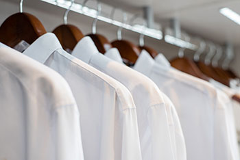 white shirts in a closet