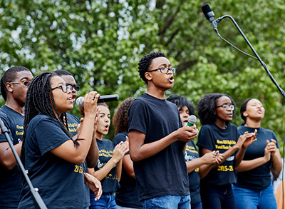 students singing