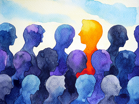 blue silhouettes of people looking the same direction with one yellow person silhouette looking the other direction